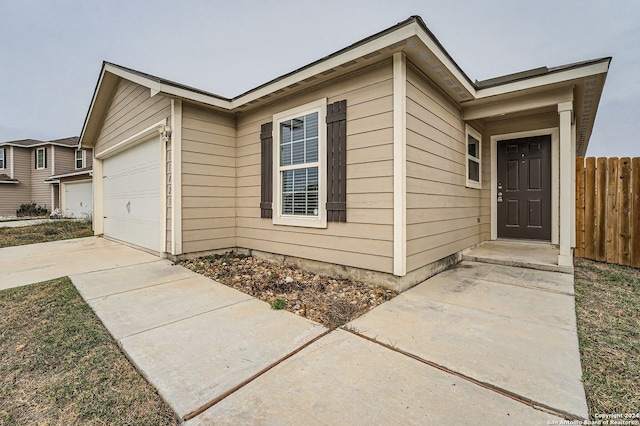 property entrance featuring a garage