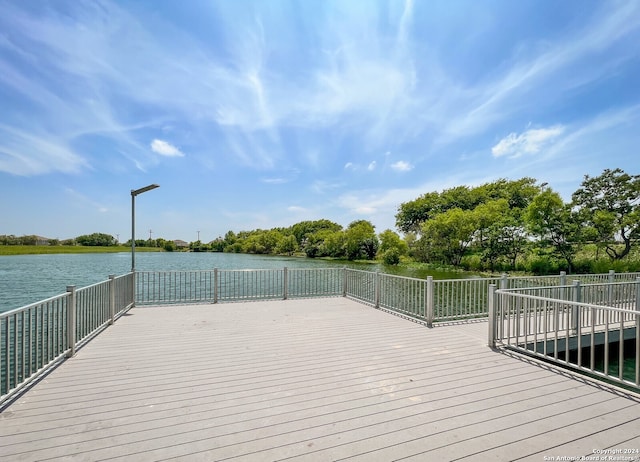 wooden terrace with a water view