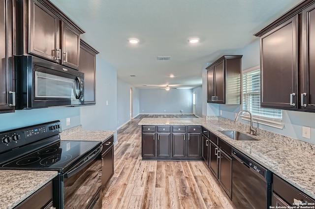 kitchen with ceiling fan, sink, kitchen peninsula, light hardwood / wood-style floors, and black appliances