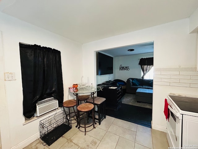 tiled dining area featuring cooling unit