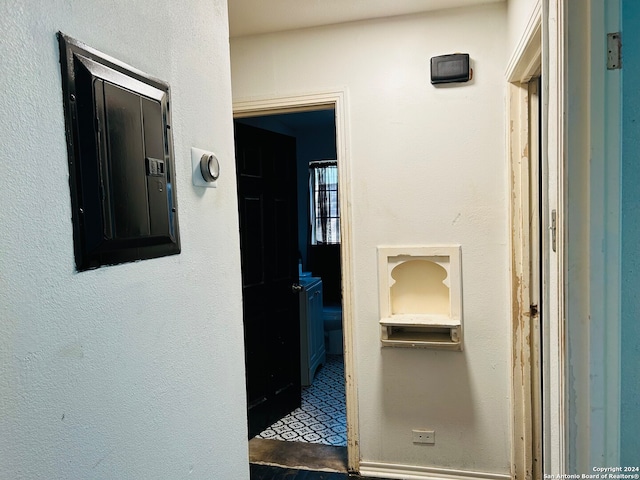 hallway with electric panel