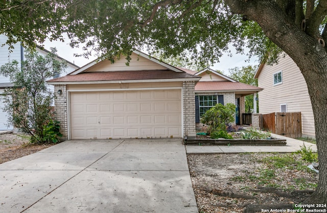 ranch-style home with a garage