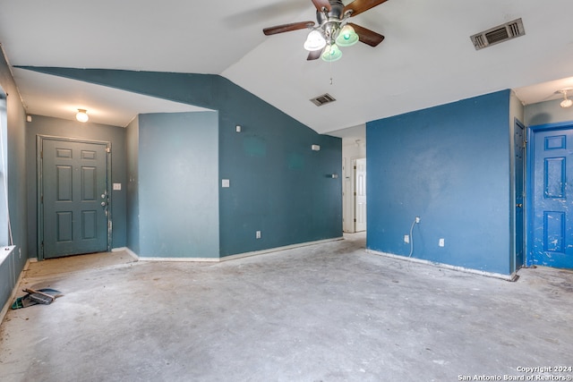 spare room featuring ceiling fan and vaulted ceiling