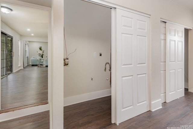 corridor featuring dark hardwood / wood-style floors