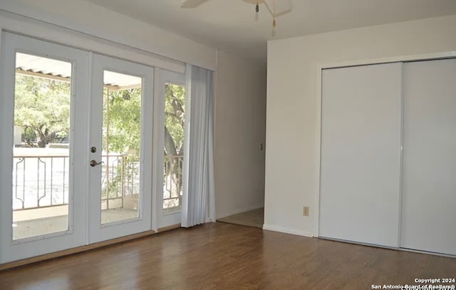 doorway to outside with ceiling fan, dark hardwood / wood-style flooring, french doors, and a healthy amount of sunlight