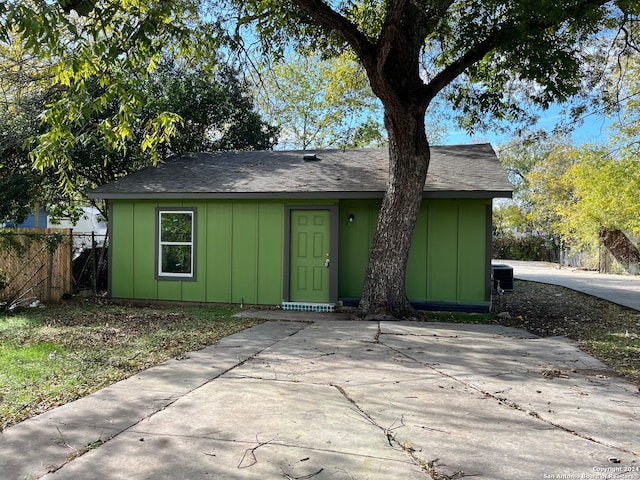 ranch-style house featuring central AC unit and a patio