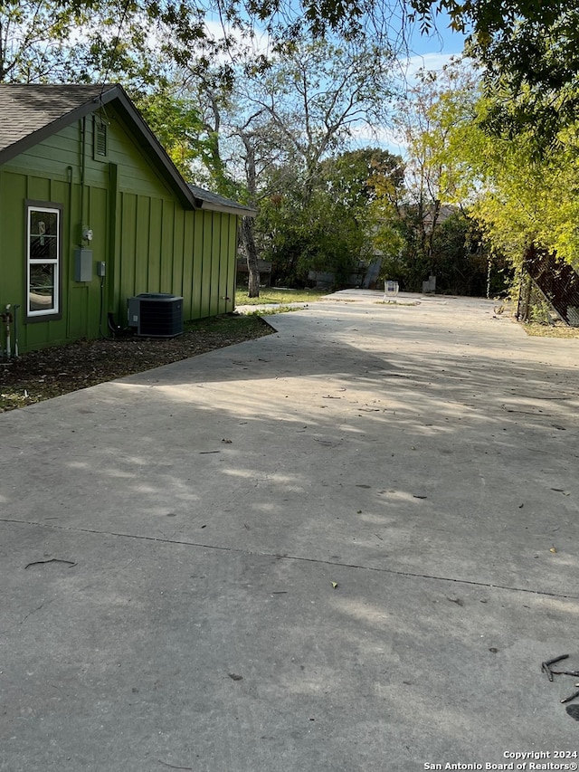 view of home's exterior with central AC unit