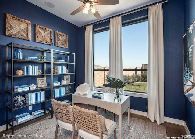 office space with wood-type flooring and ceiling fan