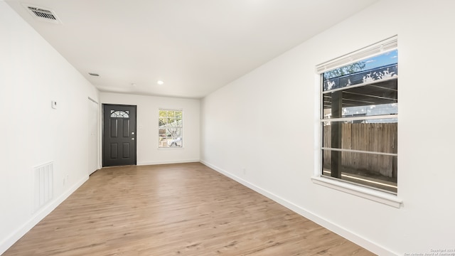 entrance foyer featuring light wood-type flooring