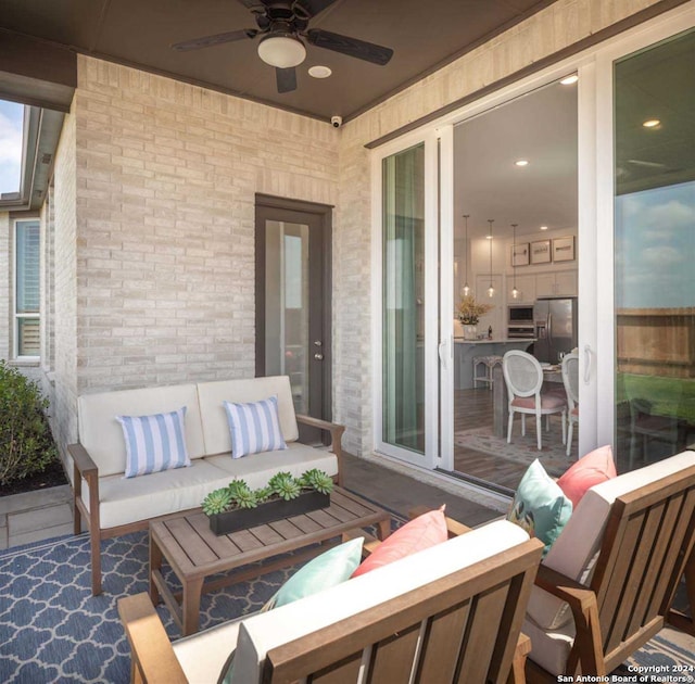 view of patio / terrace with an outdoor hangout area and ceiling fan