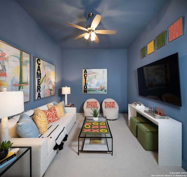 living room with carpet flooring and ceiling fan