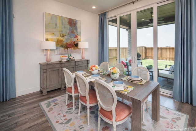 dining space featuring dark hardwood / wood-style floors