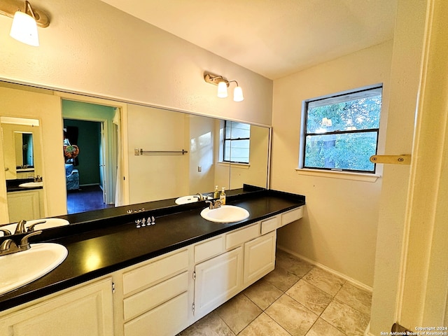 bathroom featuring tile patterned floors and vanity