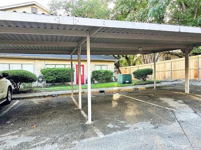 view of parking featuring a carport