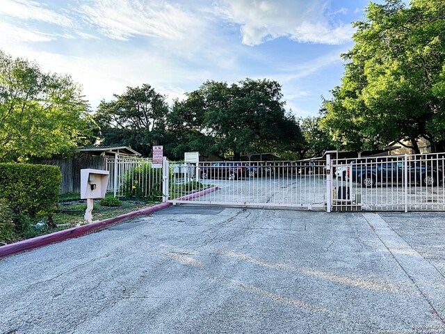 829 W Bitters Rd Unit 802, San Antonio, TX 78216 - view of gate featuring fence