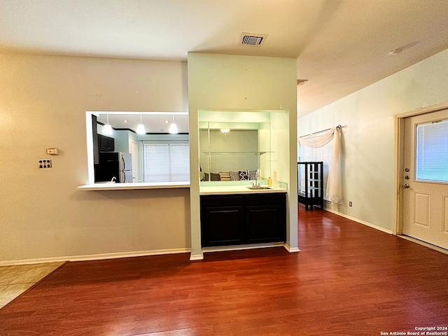 interior space with hardwood / wood-style floors and vanity