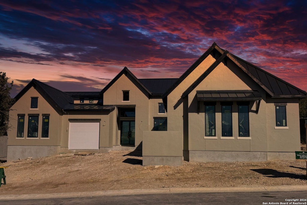 view of front of home featuring a garage