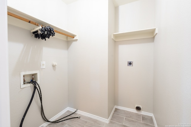 clothes washing area with hookup for a washing machine and electric dryer hookup