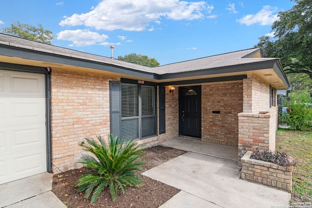 entrance to property with a garage