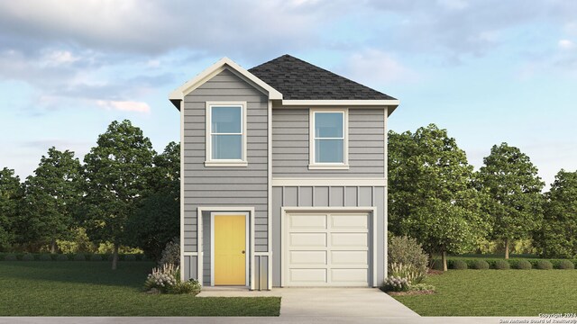 view of front facade featuring a front yard and a garage