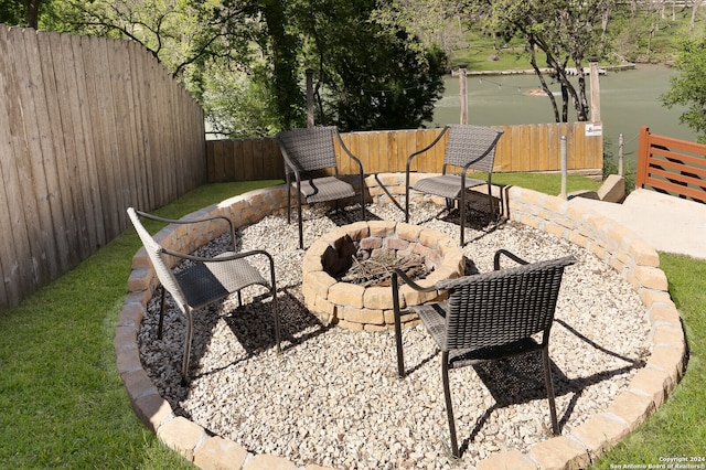 view of patio / terrace featuring a fire pit