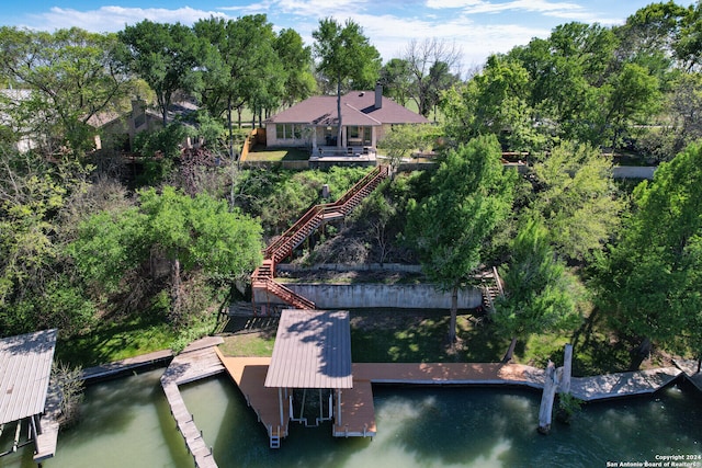 bird's eye view with a water view