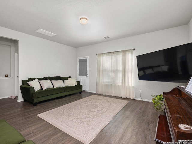 living room with dark wood-type flooring