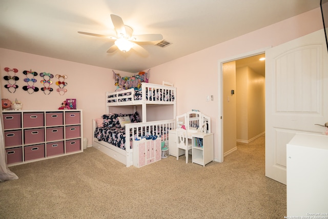 bedroom with ceiling fan and carpet floors