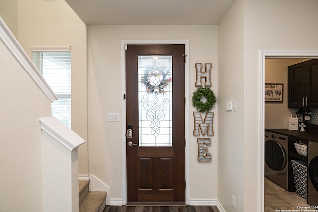 entryway featuring washer / clothes dryer and wood-type flooring