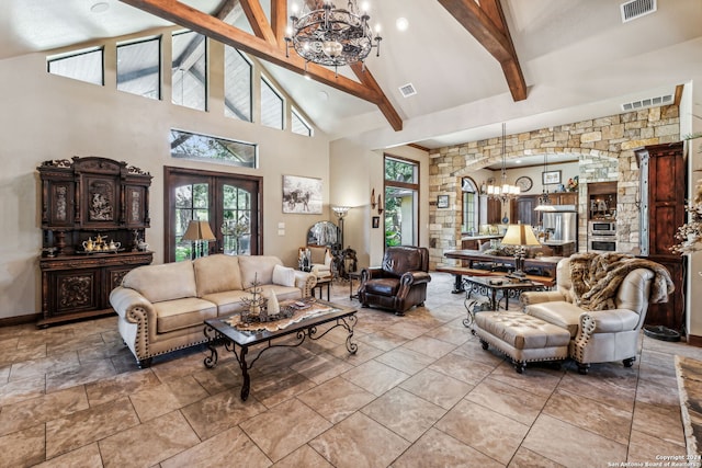 living room featuring beam ceiling, high vaulted ceiling, and a chandelier