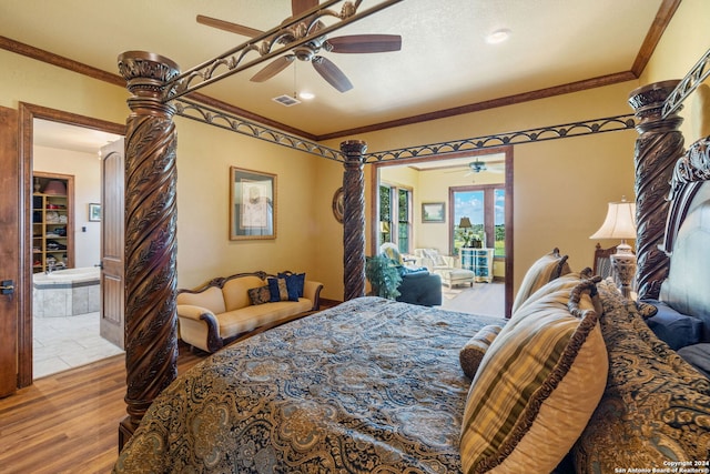 bedroom with ceiling fan, wood-type flooring, and ornamental molding