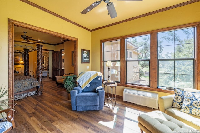 interior space with multiple windows, ceiling fan, crown molding, and hardwood / wood-style flooring