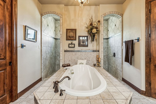 bathroom with tiled bath