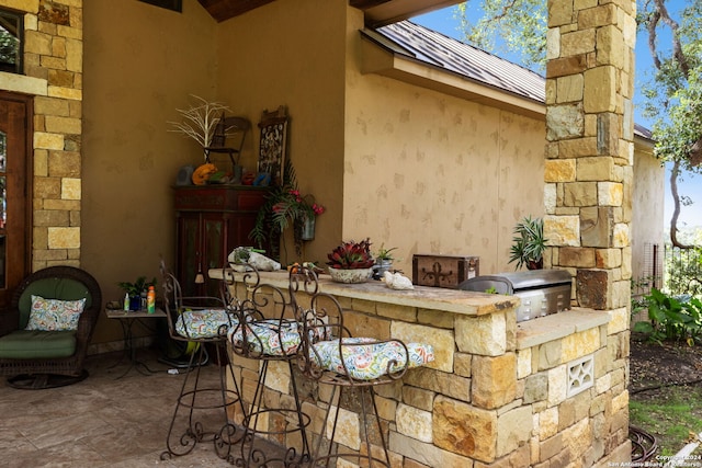 view of patio / terrace with an outdoor kitchen