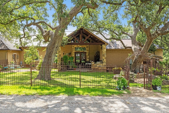 view of front of home with a front yard