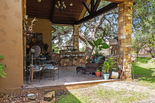 view of patio with a bar