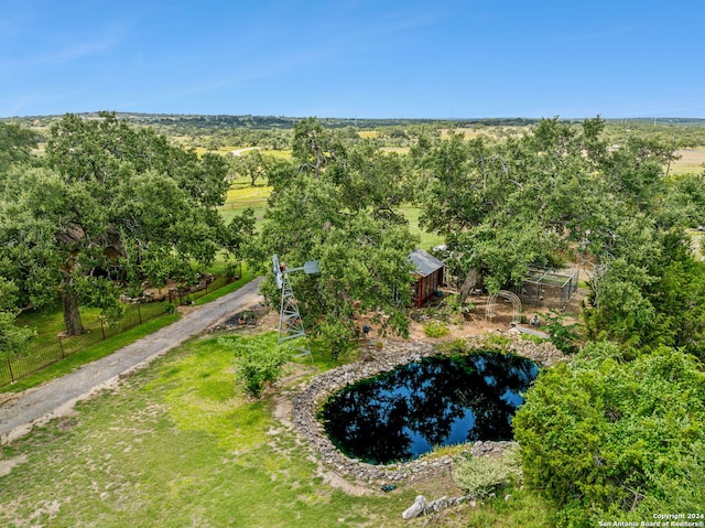 bird's eye view with a rural view and a water view