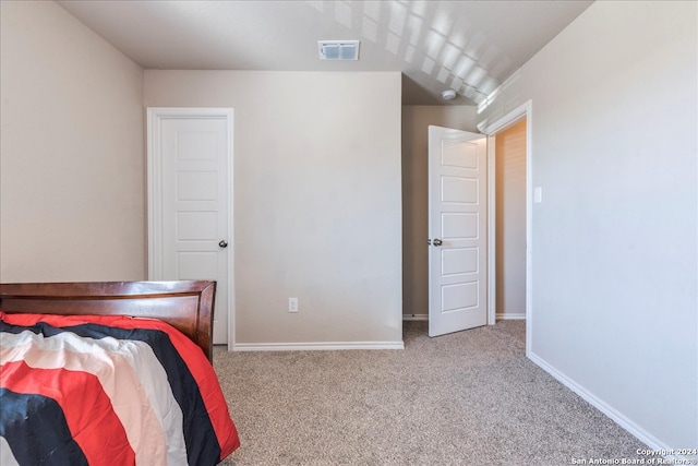 unfurnished bedroom featuring light colored carpet