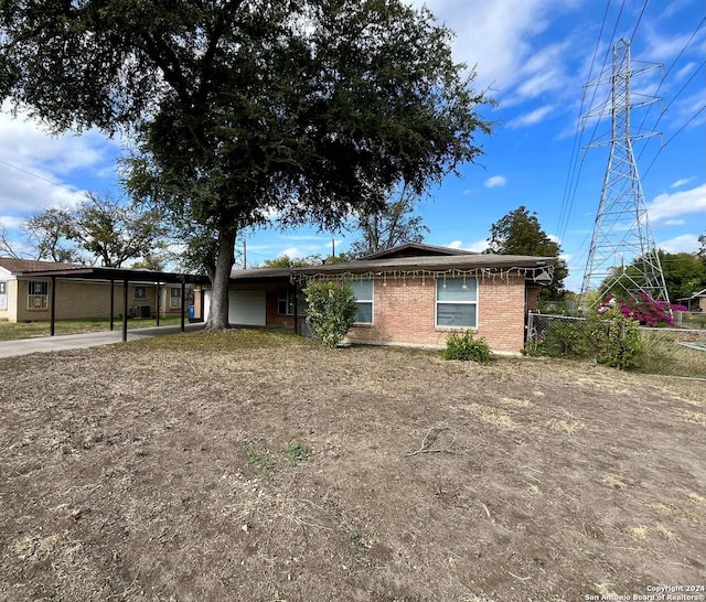 view of front of house with a carport