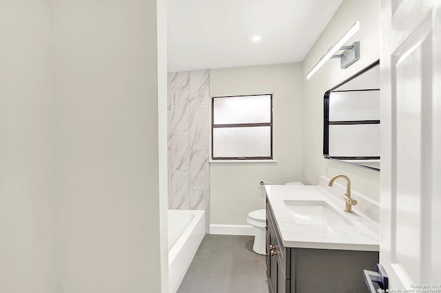 full bathroom with tile patterned flooring, vanity, toilet, and tiled shower / bath