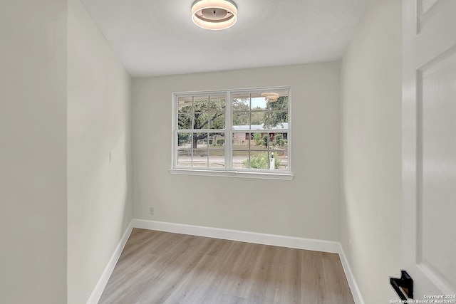 empty room with light wood-type flooring