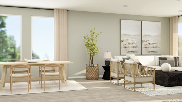 sitting room with light wood-type flooring