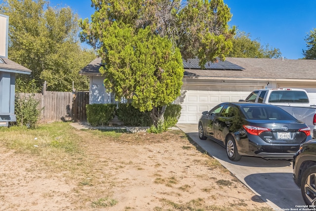 view of home's exterior featuring a garage