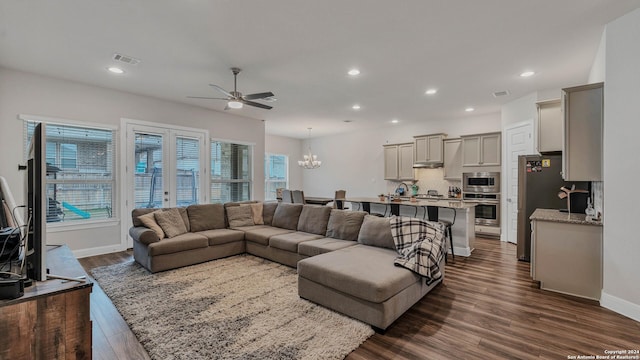 222 Sigel Ave, New Braunfels, TX 78132 - living area featuring dark wood-style floors, ceiling fan, a chandelier, recessed lighting, and baseboards