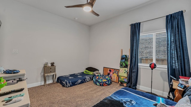 222 Sigel Ave, New Braunfels, TX 78132 - bedroom with baseboards, a ceiling fan, and carpet