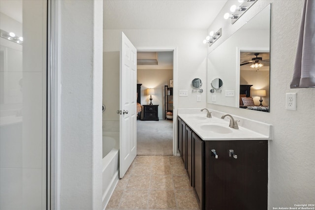 bathroom featuring vanity and ceiling fan