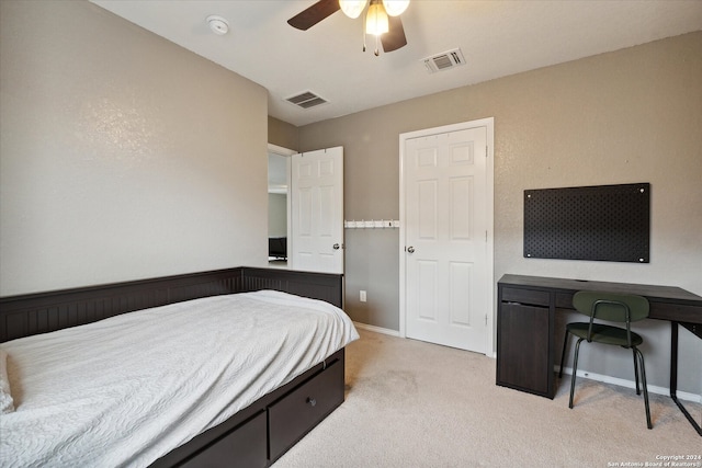 bedroom featuring ceiling fan and light colored carpet