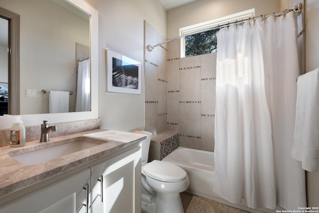 full bathroom featuring shower / bath combination with curtain, toilet, and vanity