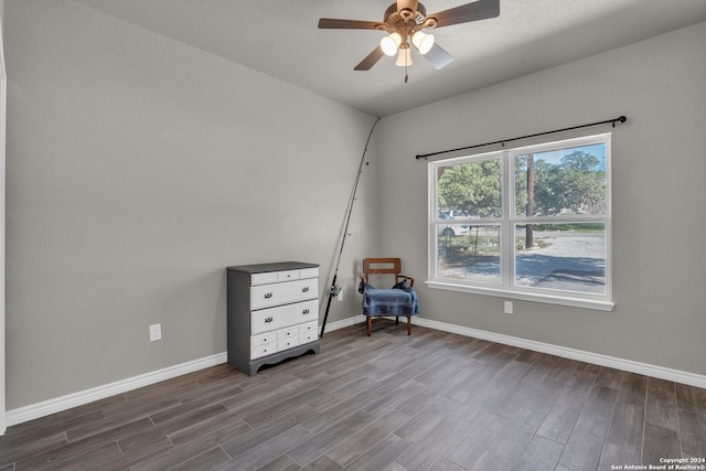 unfurnished room with hardwood / wood-style floors and ceiling fan