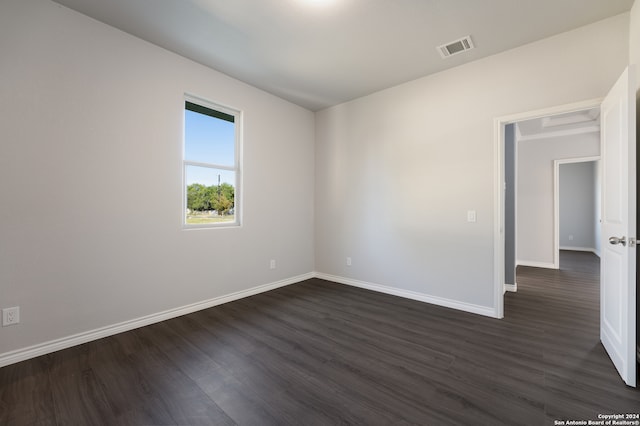 empty room featuring dark hardwood / wood-style floors